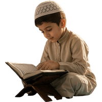 A young boy sits in a mosque, intently reading the Quran, surrounded by traditional Islamic decor.